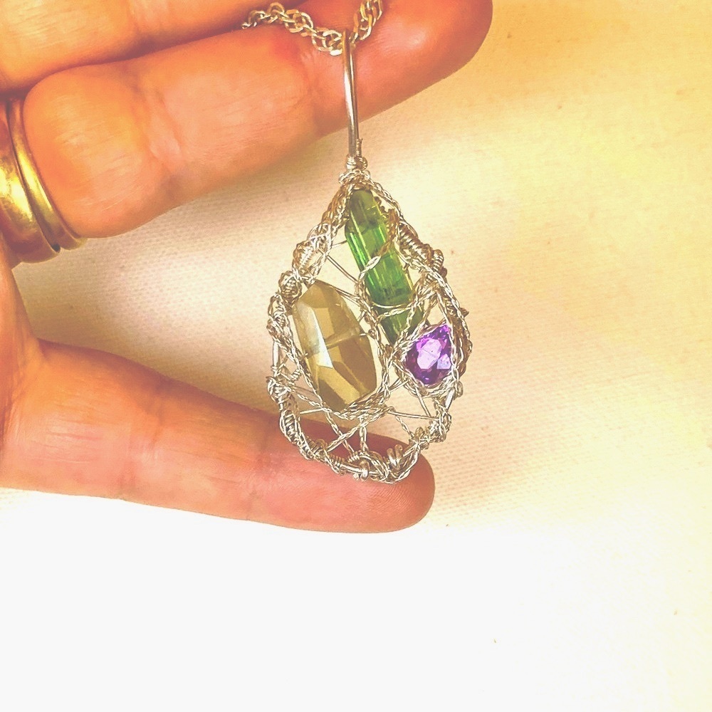 Multi gemstone Sterling silver pendant is‎ overflowing